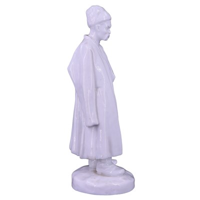 Lot 1352 - A Russian porcelain figure of a Malorussian...