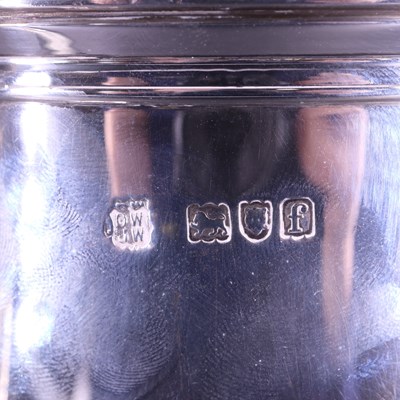 Lot 902 - An Edwardian oversized silver lidded tankard...