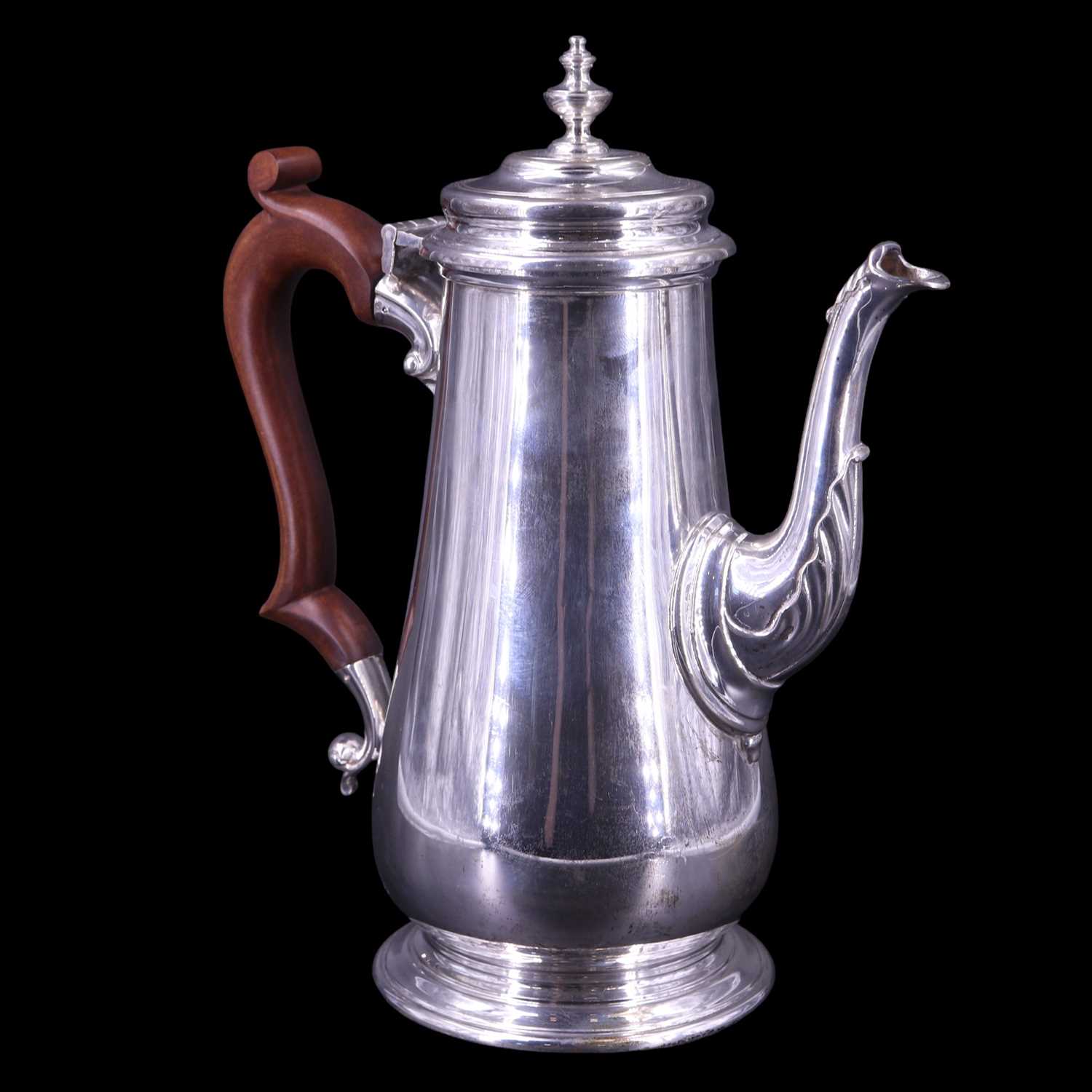 Lot 903 - A 1970s silver coffee pot of Georgian form,...