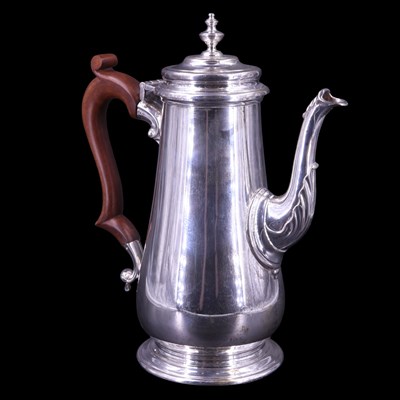 Lot 903 - A 1970s silver coffee pot of Georgian form,...