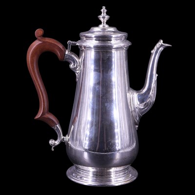 Lot 903 - A 1970s silver coffee pot of Georgian form,...
