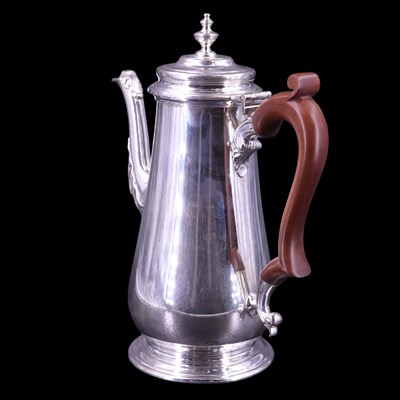Lot 903 - A 1970s silver coffee pot of Georgian form,...