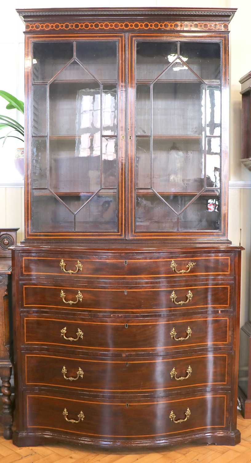 Lot 1555 - A fine George III inlaid mahogany bookcase...