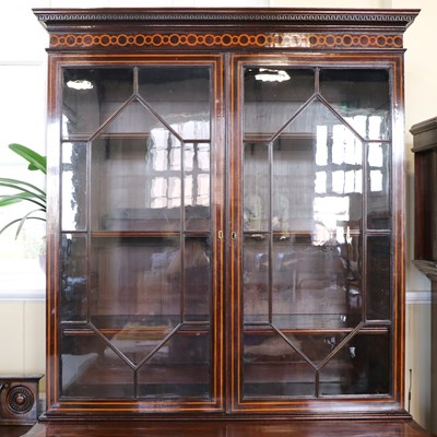 Lot 1555 - A fine George III inlaid mahogany bookcase...