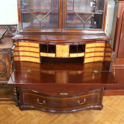 Lot 1555 - A fine George III inlaid mahogany bookcase...