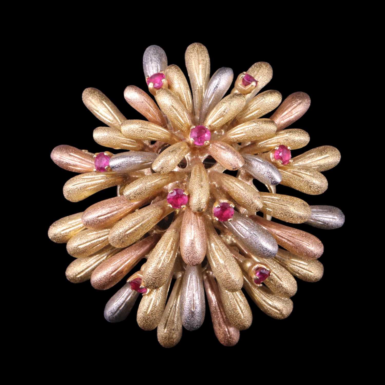 Lot 1519 - A ruby-set three-colour 18 ct gold brooch,...