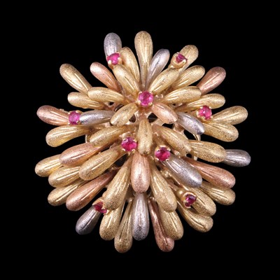 Lot 1519 - A ruby-set three-colour 18 ct gold brooch,...