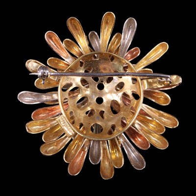 Lot 1519 - A ruby-set three-colour 18 ct gold brooch,...