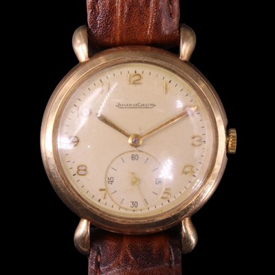 Lot 1558 - A 1950s Jaeger-LeCoultre 9 ct gold wristwatch...