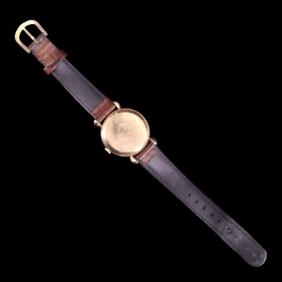 Lot 1558 - A 1950s Jaeger-LeCoultre 9 ct gold wristwatch...
