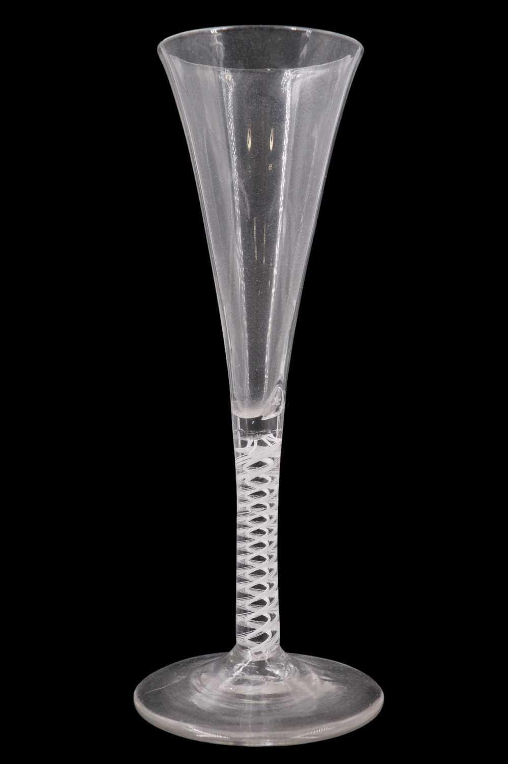 Lot 1392 - A mid 18th Century opaque twist ale glass, of...