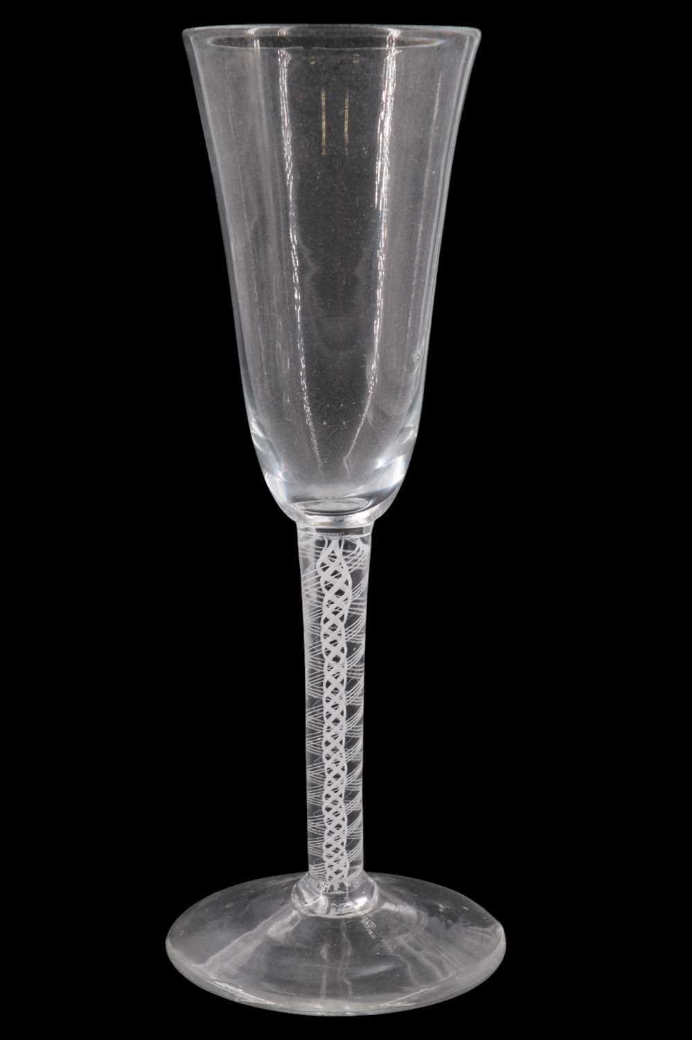 Lot 1378 - A mid 18th Century opaque twist stemmed ale...