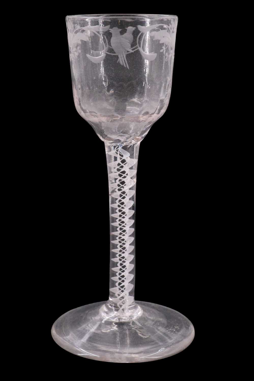 Lot 1380 - A mid 18th Century opaque twist stemmed wine...