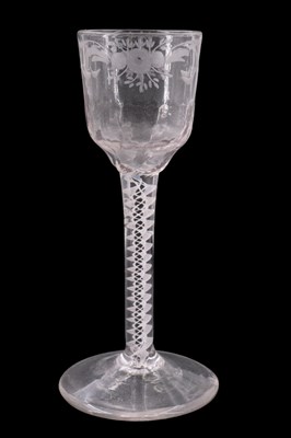 Lot 1380 - A mid 18th Century opaque twist stemmed wine...