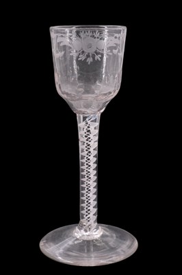 Lot 1380 - A mid 18th Century opaque twist stemmed wine...