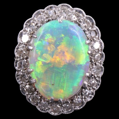 Lot 1108 - A very fine opal and diamond cluster ring...