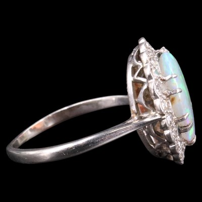 Lot 1108 - A very fine opal and diamond cluster ring...