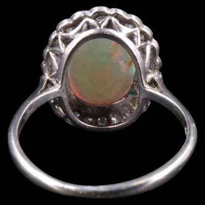 Lot 1108 - A very fine opal and diamond cluster ring...