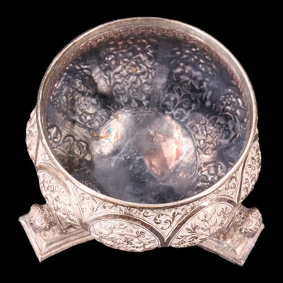 Lot 1039 - An Indian / South Asian white metal lidded...