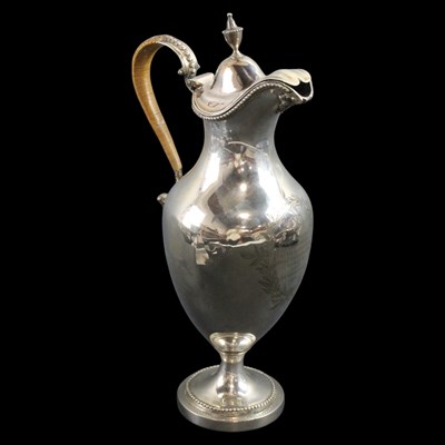 Lot 1043 - A George III silver claret jug or ewer, of...
