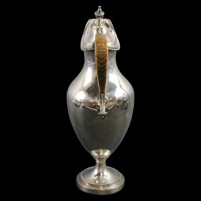 Lot 1043 - A George III silver claret jug or ewer, of...