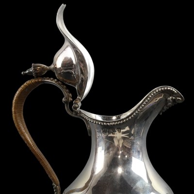 Lot 1043 - A George III silver claret jug or ewer, of...