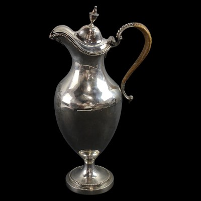 Lot 1043 - A George III silver claret jug or ewer, of...