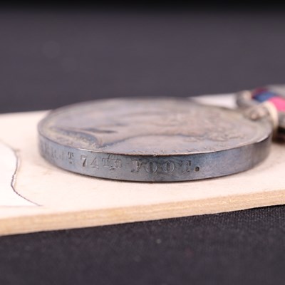 Lot 126 - A Military General Service medal with ten...