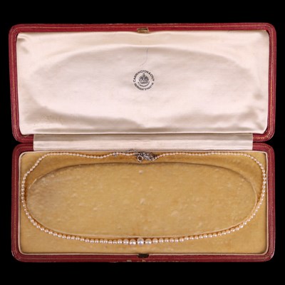 Lot 1306 - An antique graded single-strand pearl necklace...