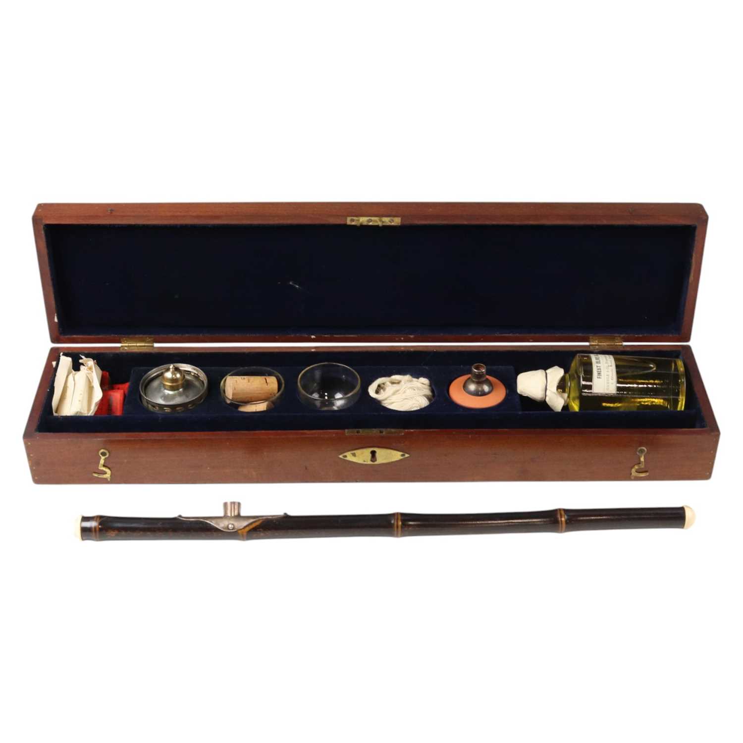 Lot 723 - A cased 19th Century opium pipe, accoutrements...