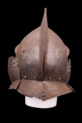 Lot 569 - A late 16th / early 17th Century burgonet, [...