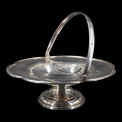 Lot 1126 - A George V silver swing-handled footed dish,...