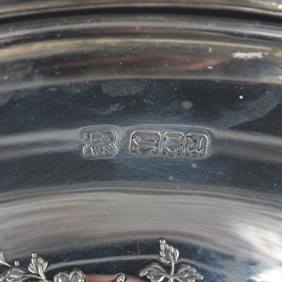 Lot 1126 - A George V silver swing-handled footed dish,...
