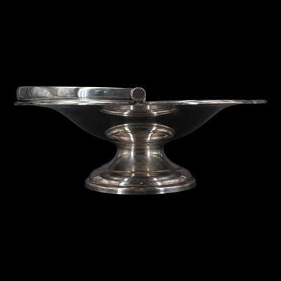 Lot 1126 - A George V silver swing-handled footed dish,...