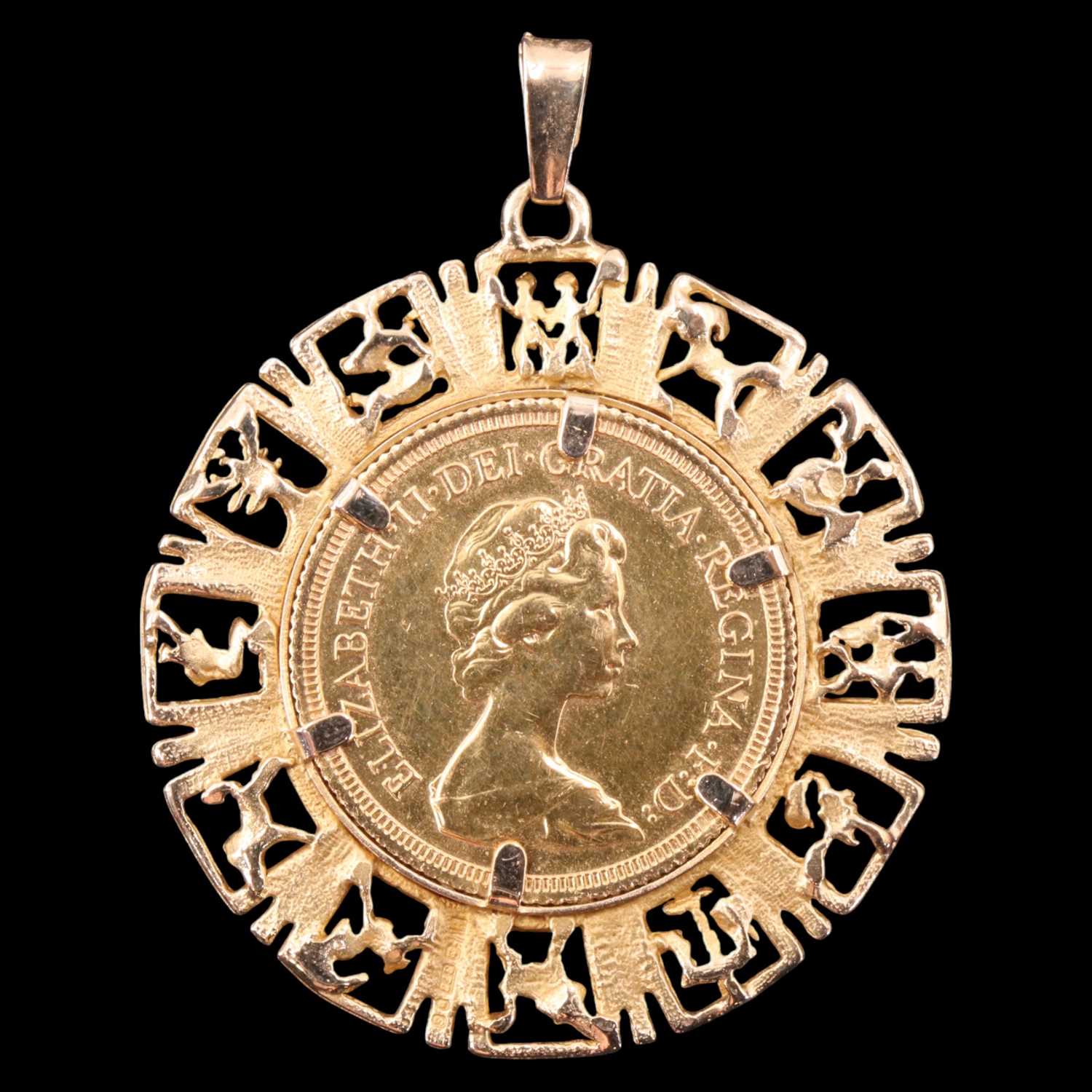 Lot 1320 - A 1978 gold sovereign in a 9 ct yellow metal...