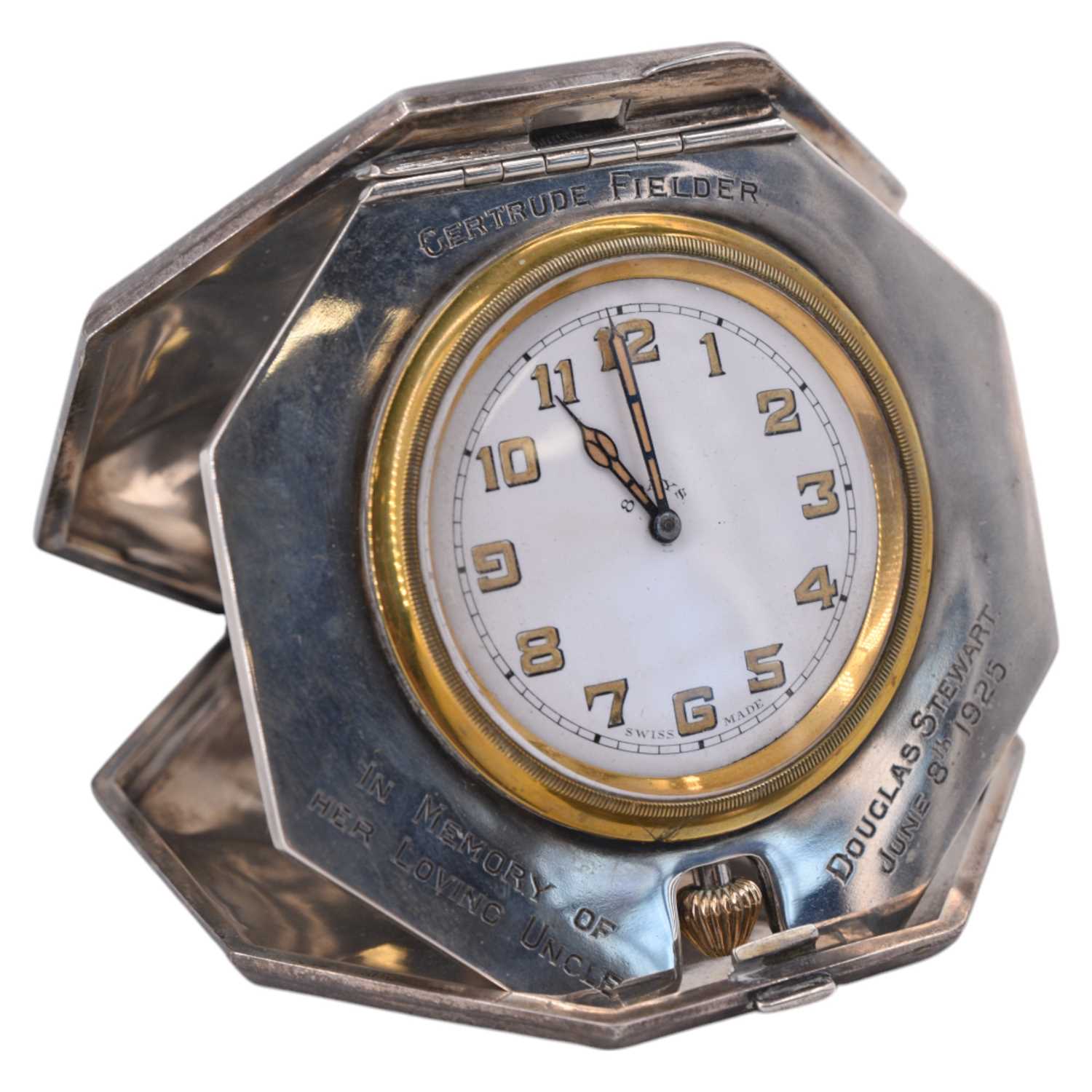Lot 1551 - A 1920s silver travel clock, having an 8-day...