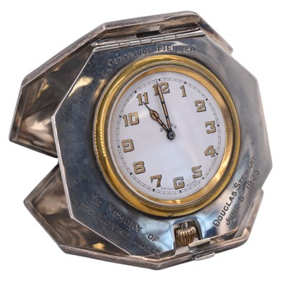 Lot 1551 - A 1920s silver travel clock, having an 8-day...