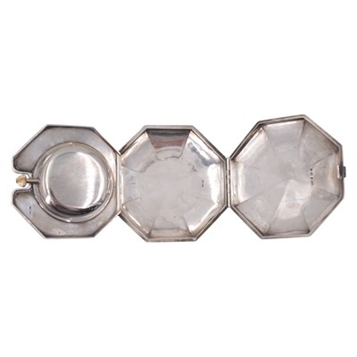 Lot 1551 - A 1920s silver travel clock, having an 8-day...
