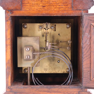 Lot 1535 - A Victorian brass-mounted oak bracket clock by...