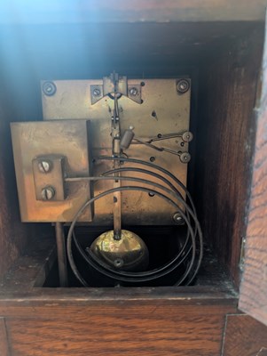 Lot 1535 - A Victorian brass-mounted oak bracket clock by...