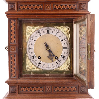 Lot 1537 - A late 19th Century inlaid-walnut bracket...
