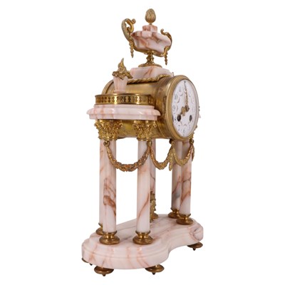 Lot 1471 - A late 19th Century French clock garniture,...