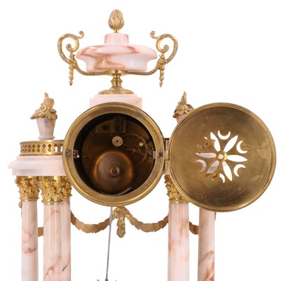 Lot 1471 - A late 19th Century French clock garniture,...