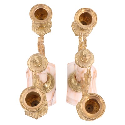 Lot 1471 - A late 19th Century French clock garniture,...