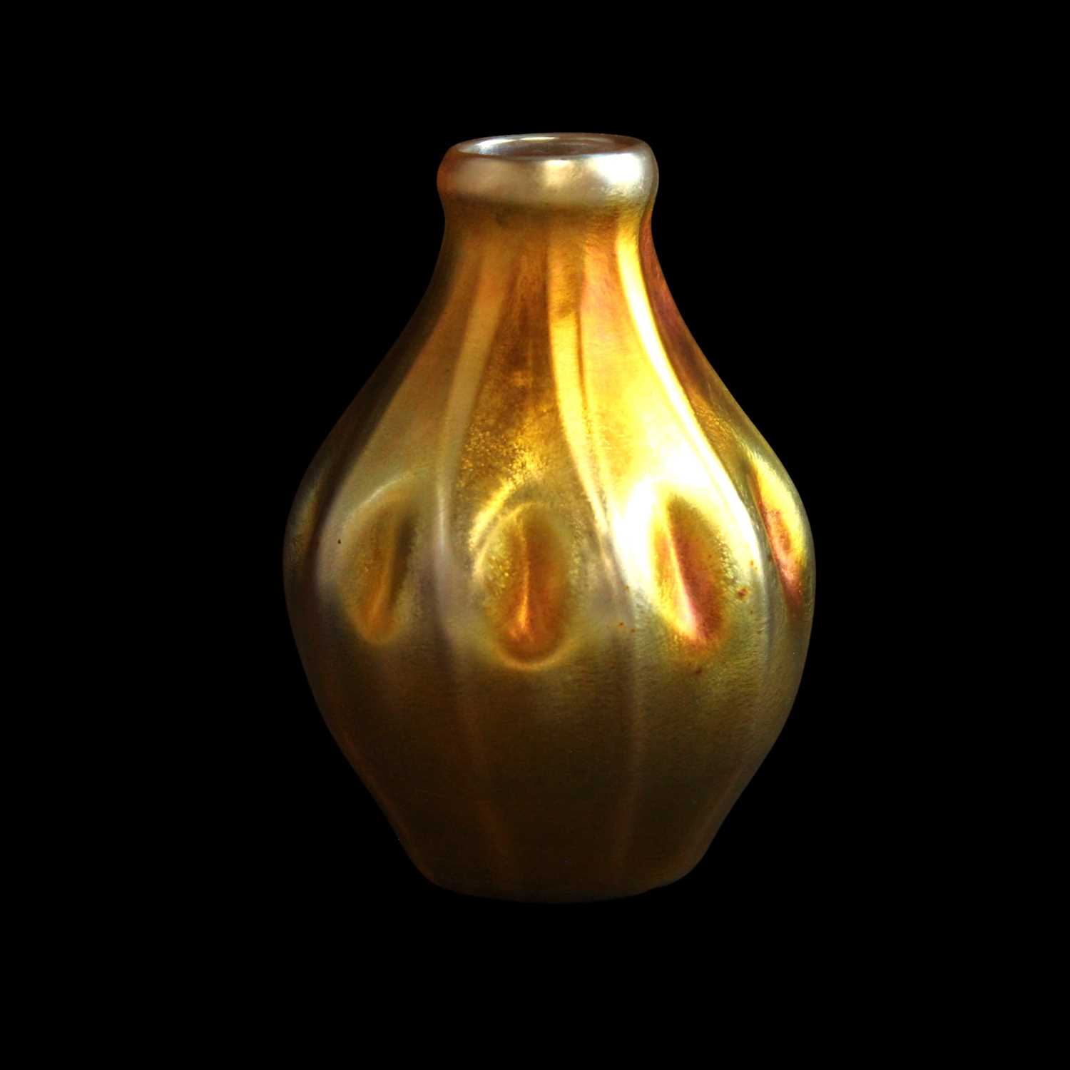 Lot 1138 - A Tiffany and Co. "Favrile" iridescent glass...