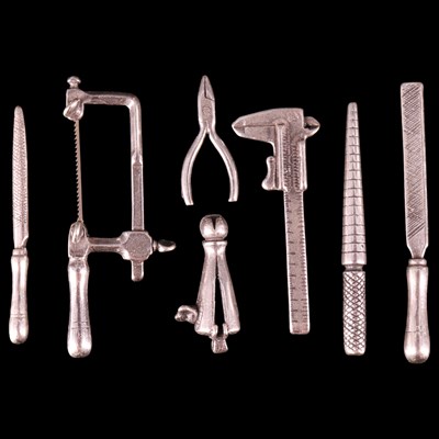 Lot 1215 - A Sterling standard white metal and walnut...