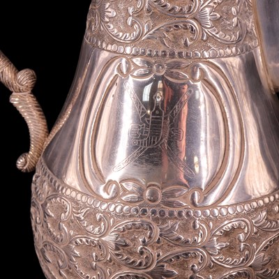 Lot 1179 - A Middle Eastern white metal dallah coffee pot,...