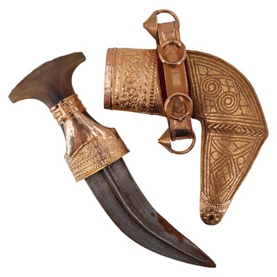 Lot 421 - An Omani yellow-metal-mounted jambiya dagger,...