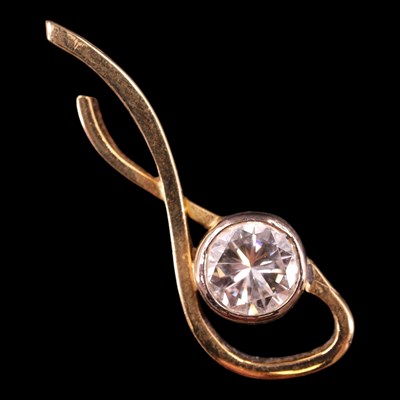 Lot 1486 - A contemporary diamond and 18 ct gold scroll...