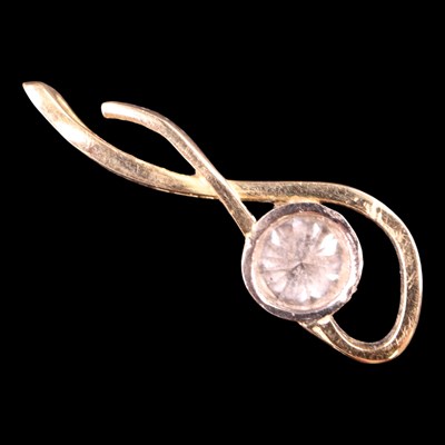 Lot 1486 - A contemporary diamond and 18 ct gold scroll...